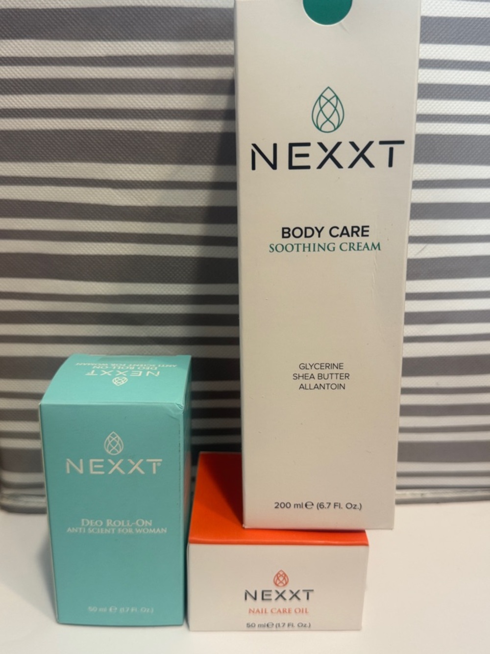 NEXXT Body Care Soothing Cream, Deo roll on, and nail care oil